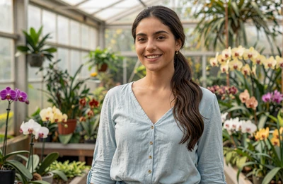 Maria, 29, Florida nursery operator from Homestead smiling in her tropical greenhouse on Yougotmatched
