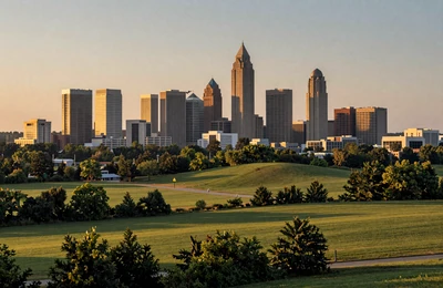 Charlotte North Carolina skyline surrounded by Piedmont farmland and rolling green hills at golden hour
